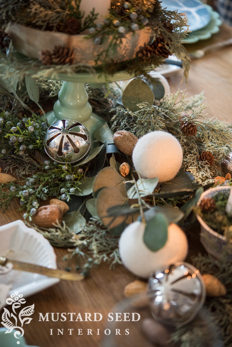 tablescape wool dryer balls and silver bells | green blue and white Christmas | missmustardseed.com