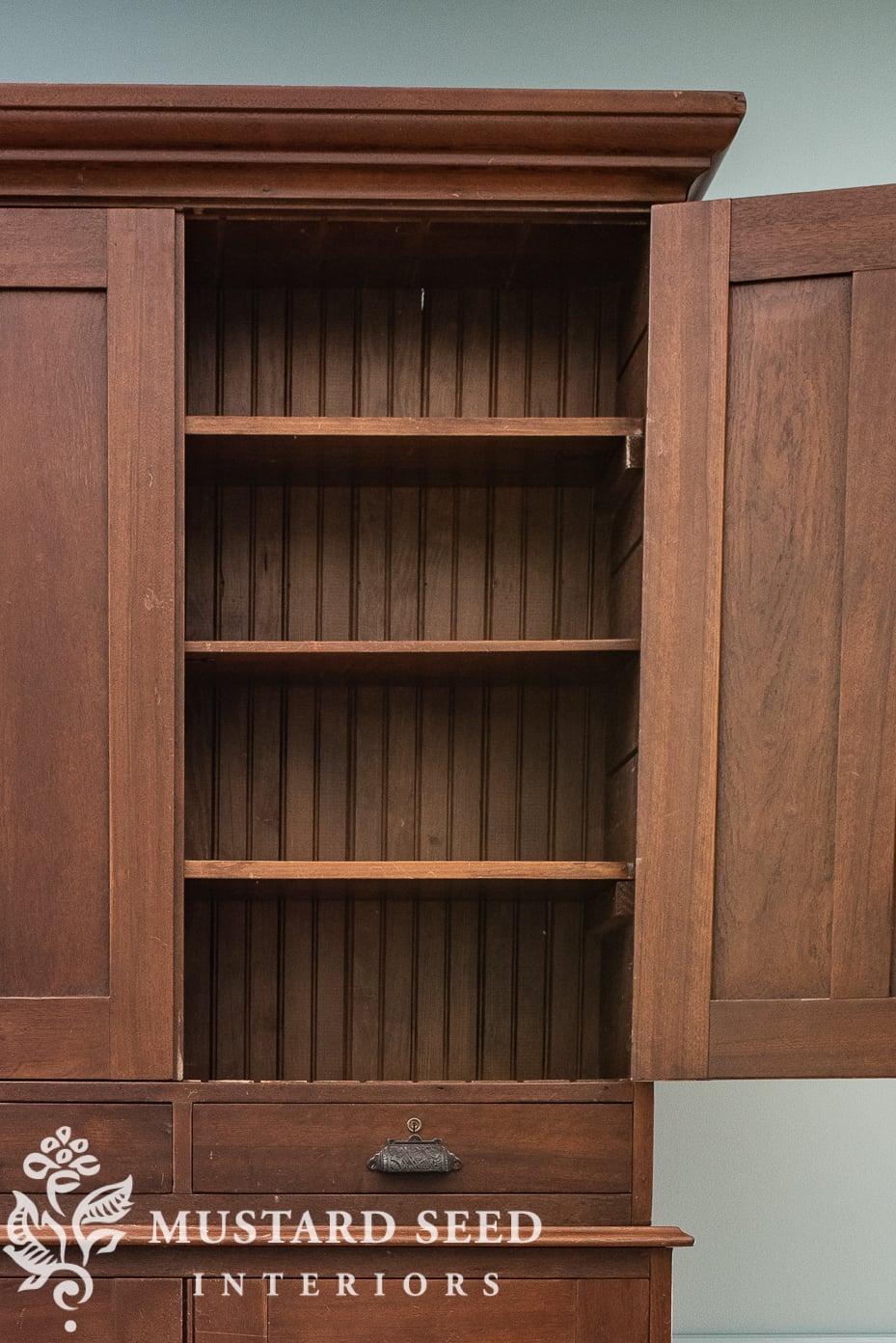 basement family room makeover | antique cabinet | miss mustard seed