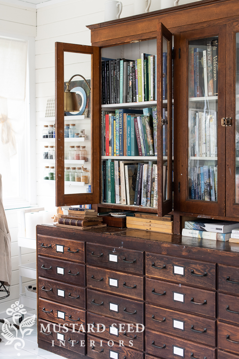 art books arranged in studio | miss mustard seed