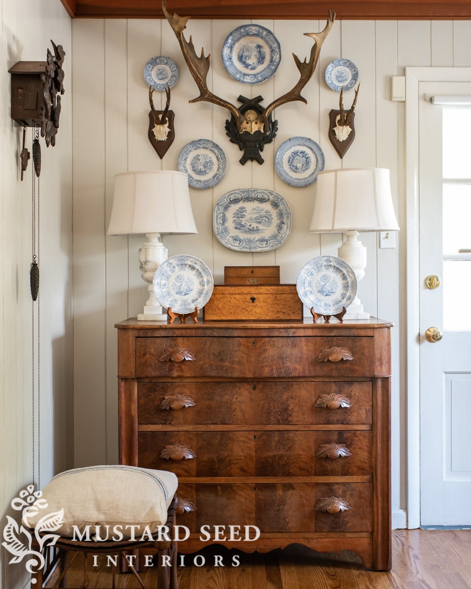 antique transferware and European stag antlers | living room | miss mustard seed