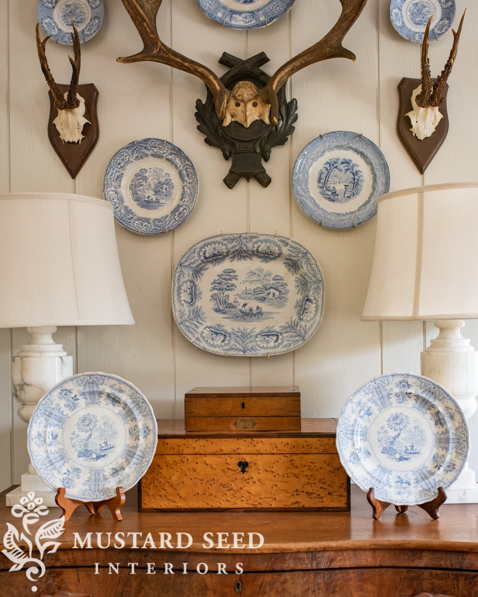 antique transferware and European stag antlers | living room | miss mustard seed