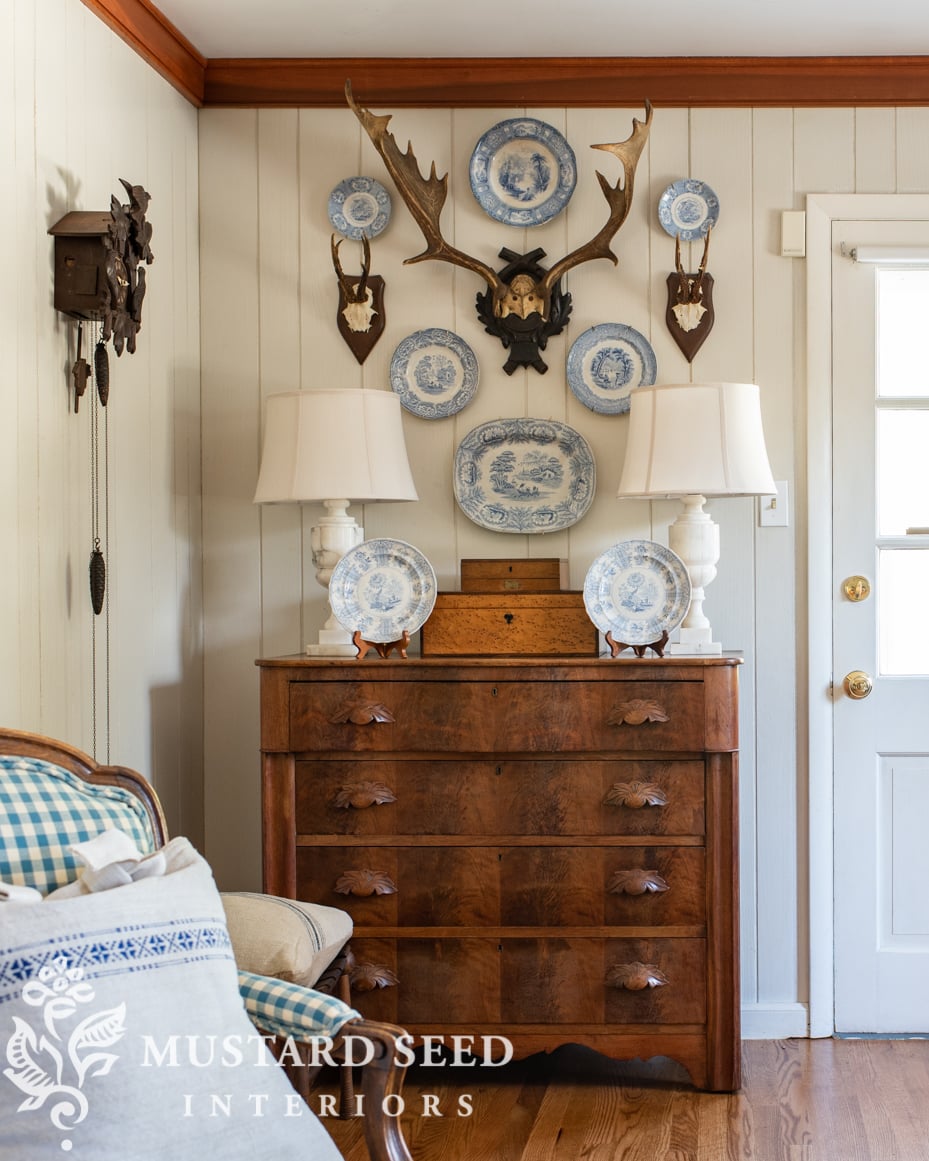 antique transferware and European stag antlers | living room | miss mustard seed