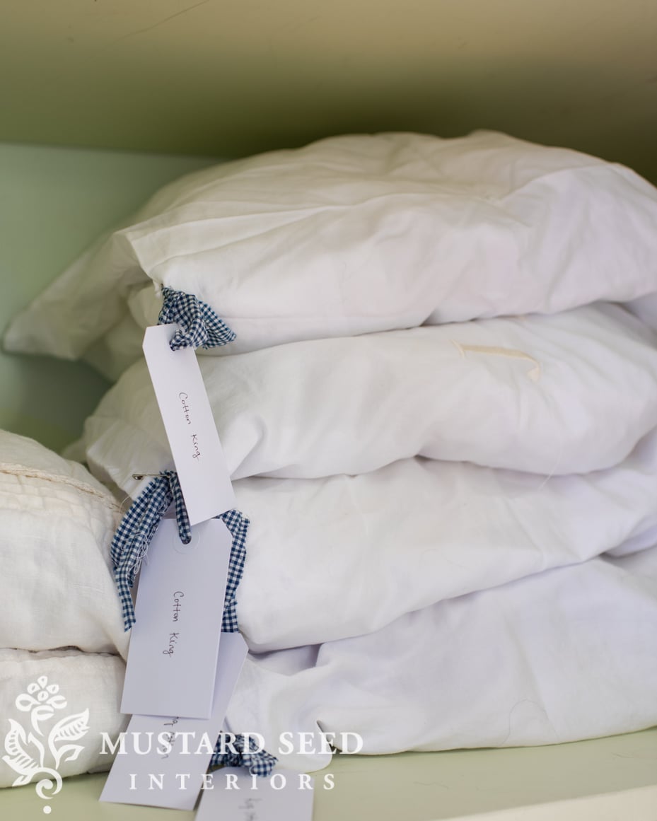 organizing the linen closets | miss mustard seed