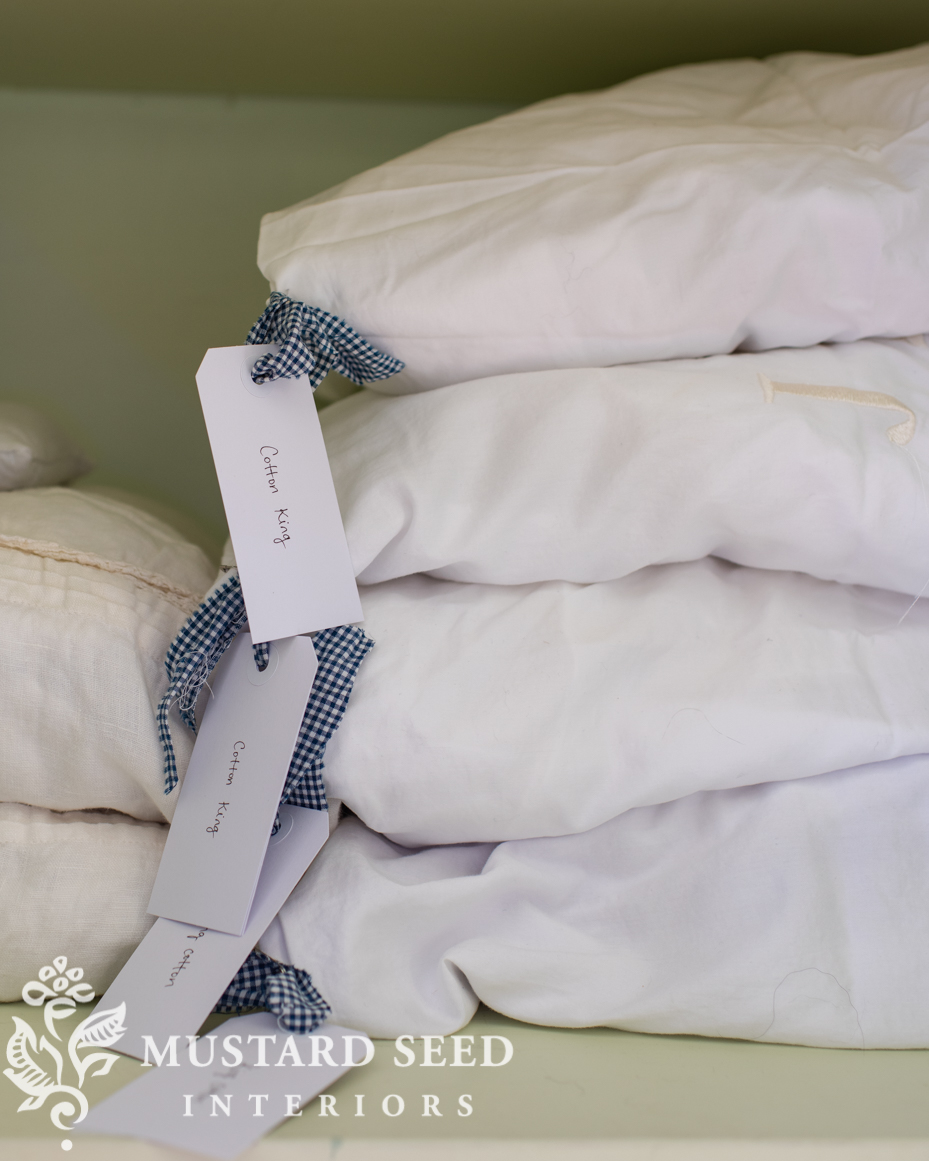 organized linen closet | miss mustard seed