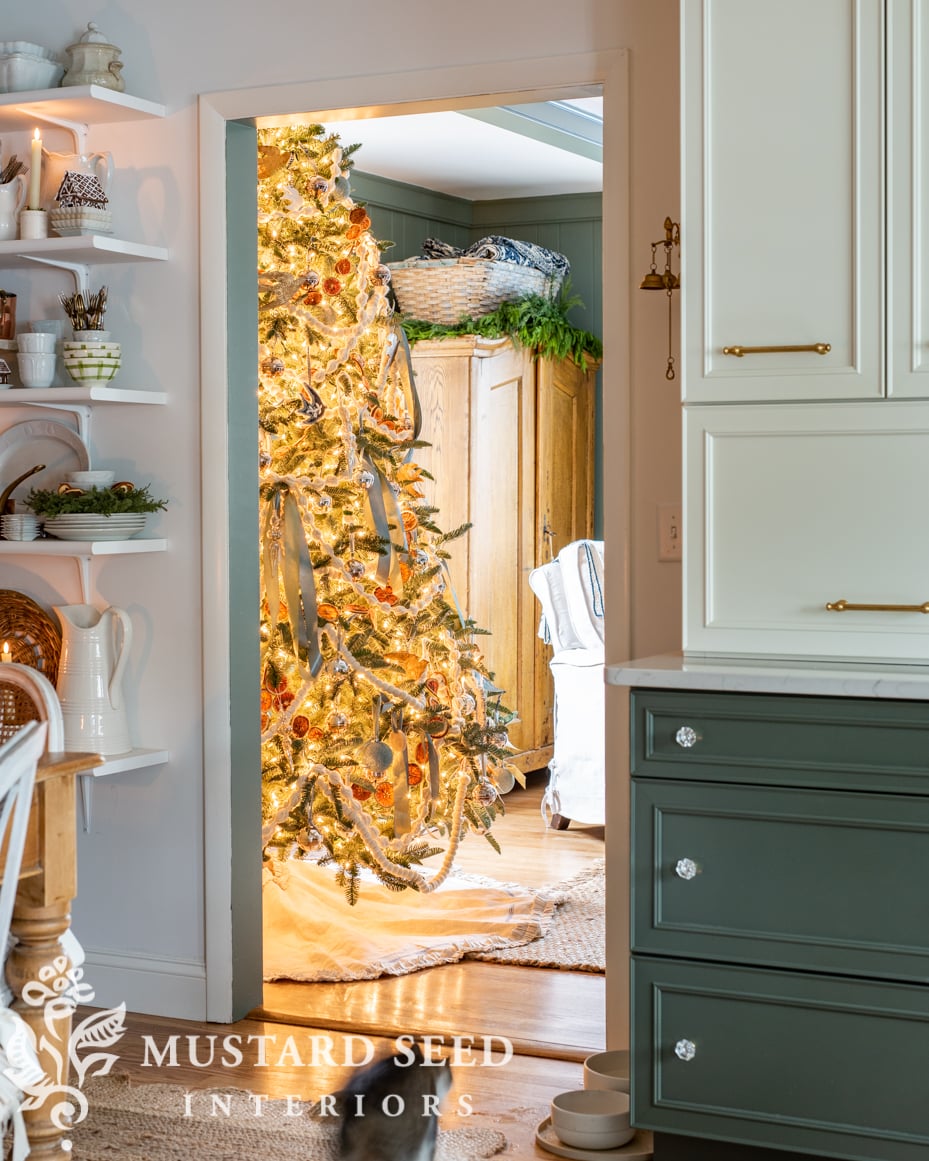 2023 Christmas tree with ribbons, crochet garland, dried oranges, and wallace silver sleigh bells | miss mustard seed