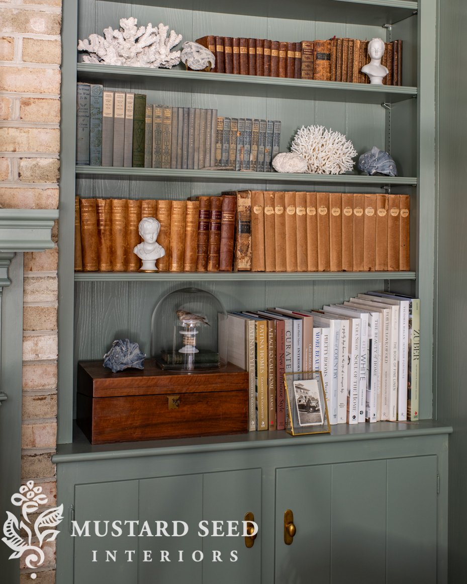 card room green living room built-in shelves | miss mustard seed