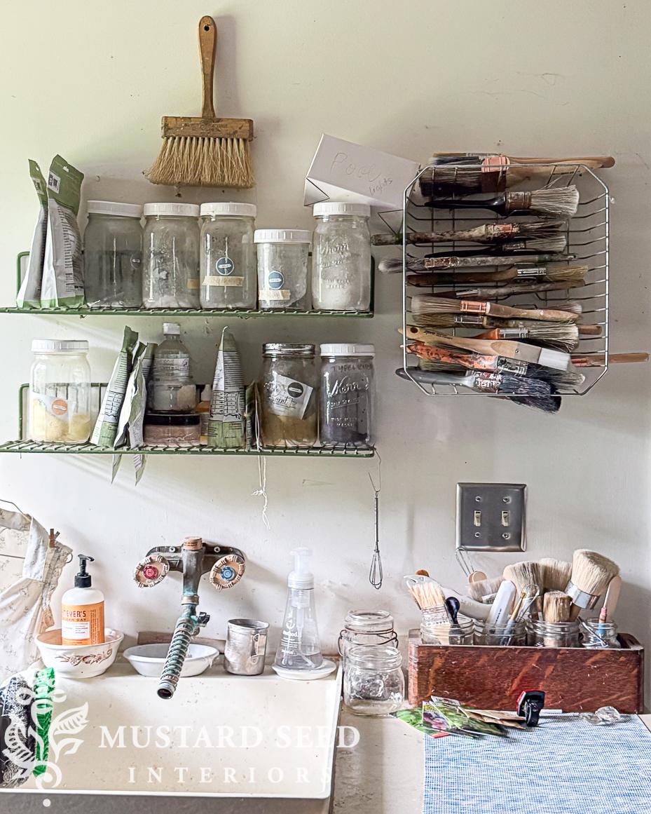 storing brushes in old dish drainer | miss mustard seed