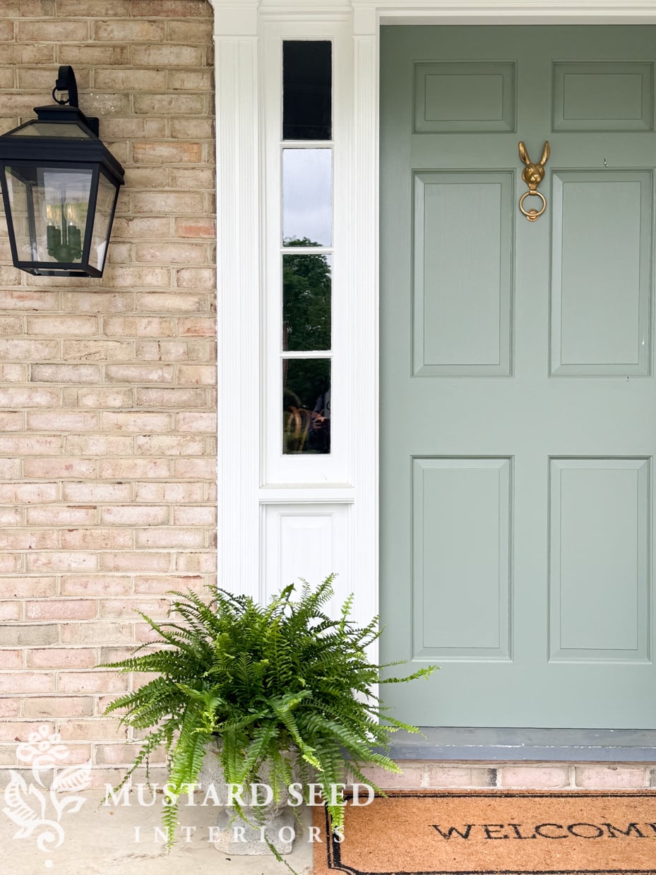 boston fern in concrete urn | card room green front door | miss mustard seed