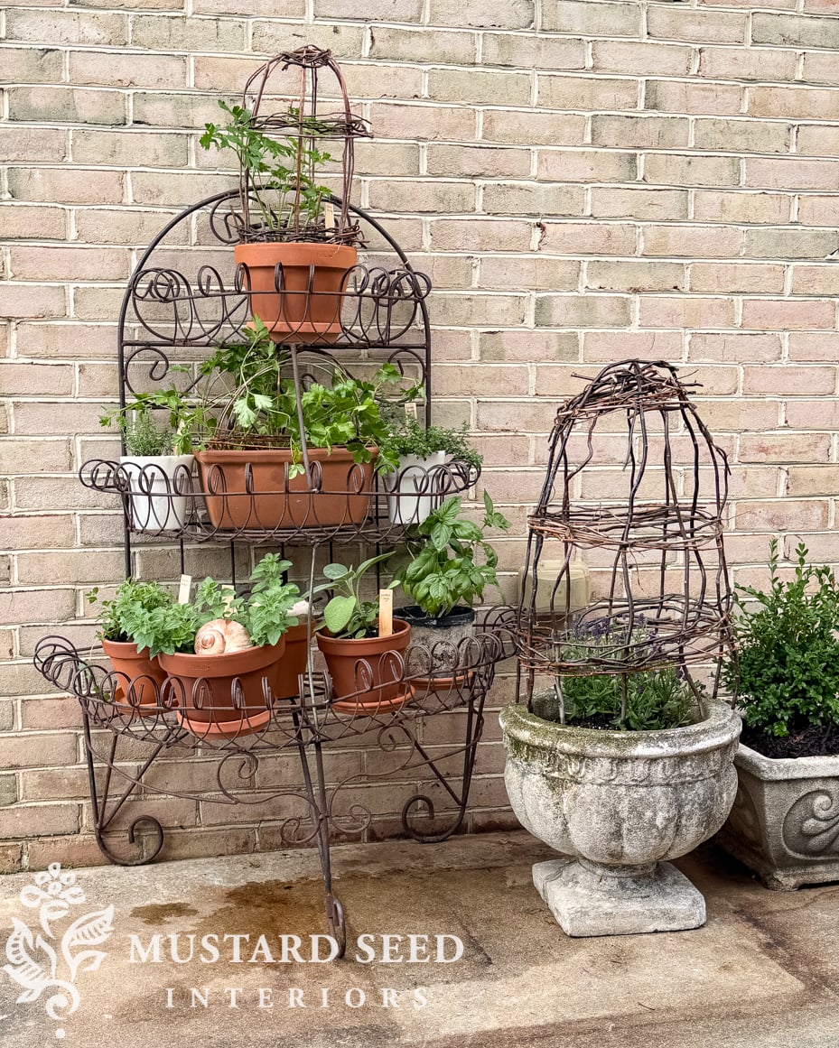 antique iron three tiered plant stand | miss mustard seed