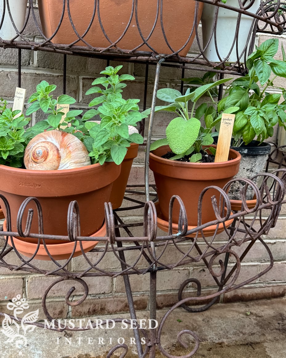 antique iron three tiered plant stand | miss mustard seed