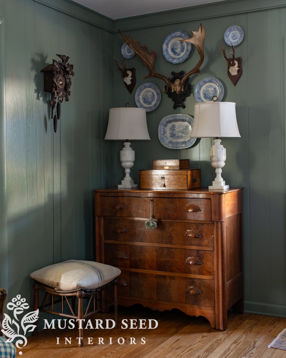 antlers and plates wall arrangement | card room green | living room decorating | antiques | miss mustard seed