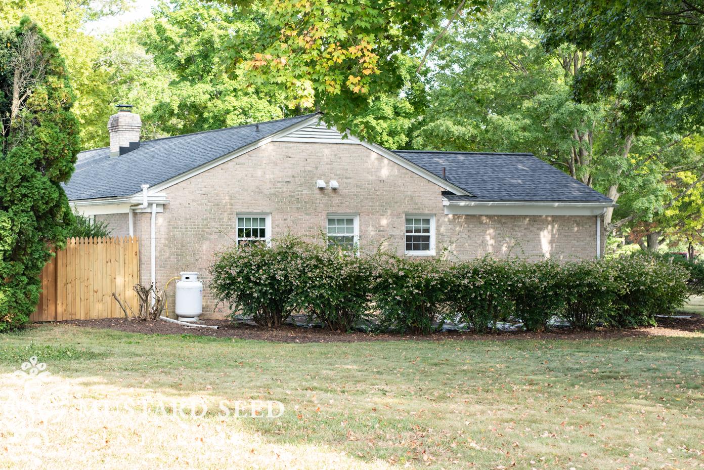 1970 brick house renovation | installing vinyl shutters on brick