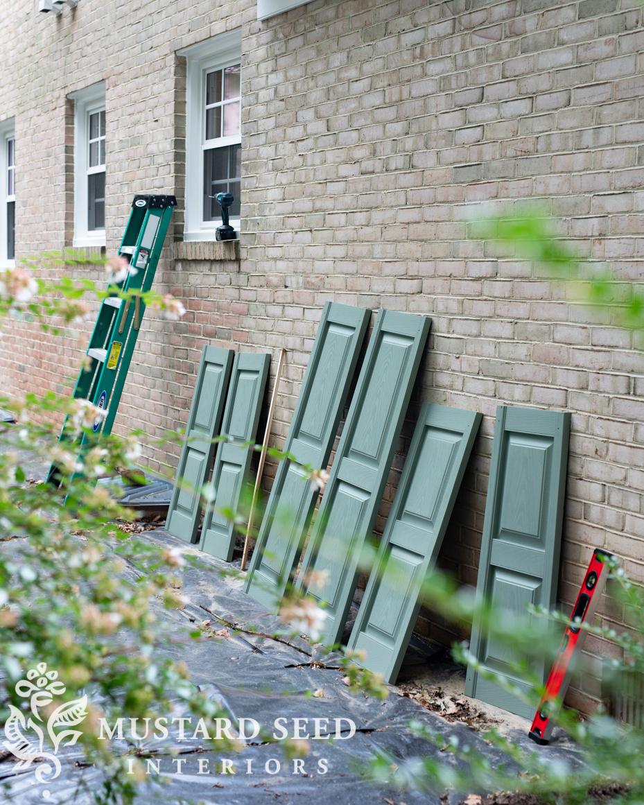 installing vinyl shutters on brick | miss mustard seed