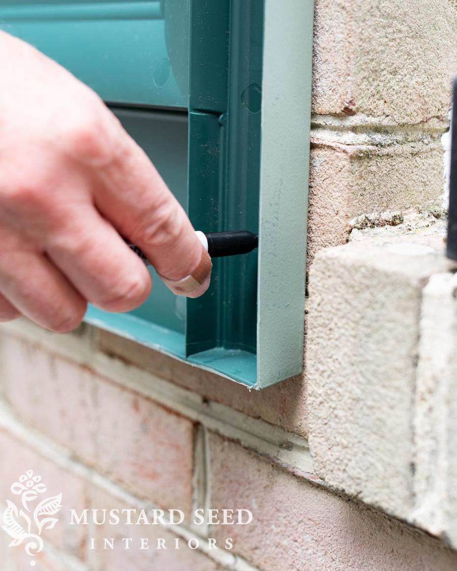 installing vinyl shutters on brick | miss mustard seed