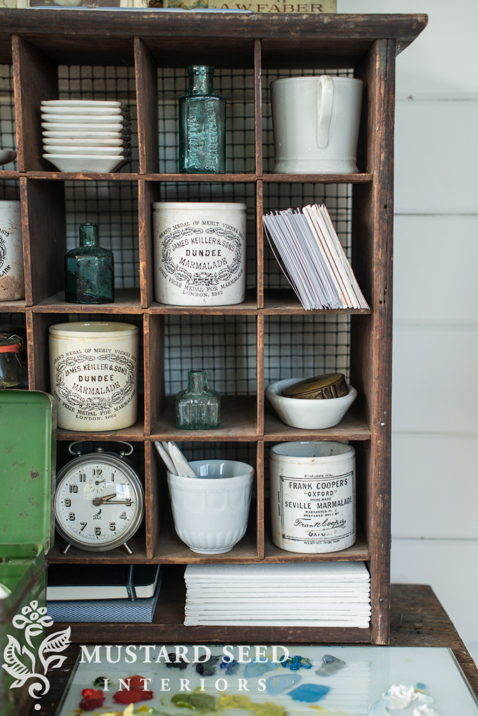 using pretty crocks, bowls, ironstone and Wreck jars to hold supplies | art studio organization | missmustardseed.com