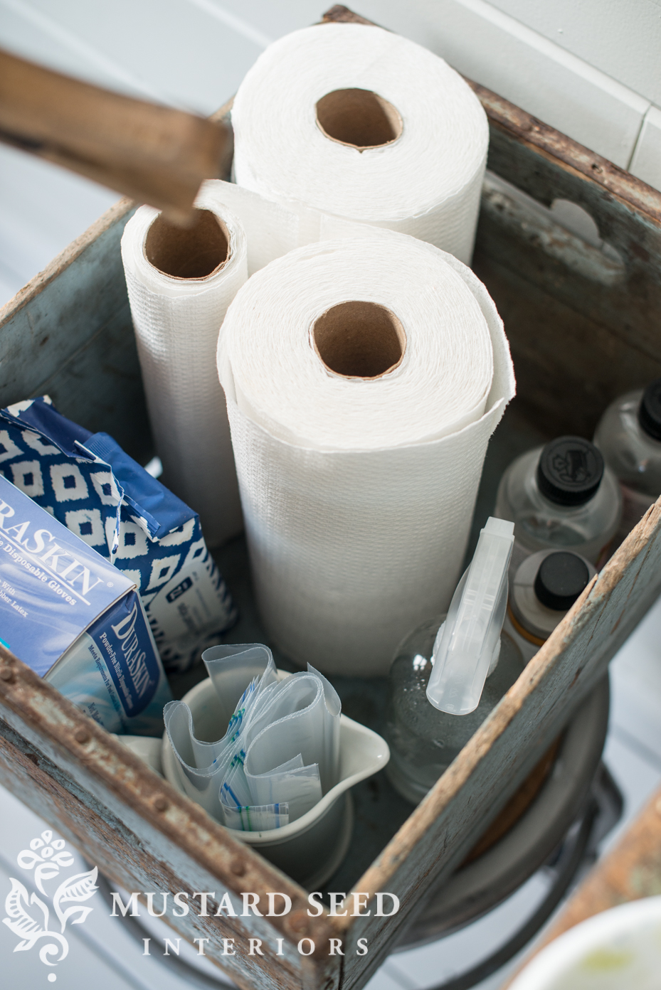 wheeled stool holds a crate for storage | missmustardseed.com