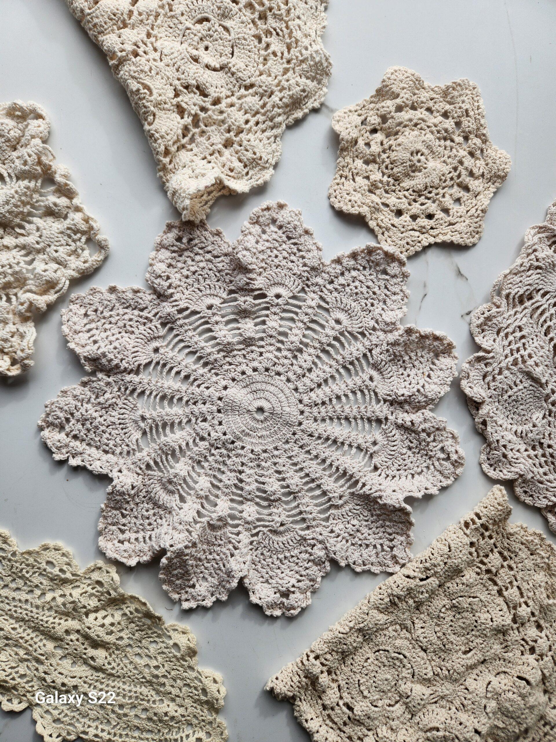 collection of antique doilies